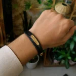 دستبند مردانه چرمی طرح Cartier با پلاک استیل